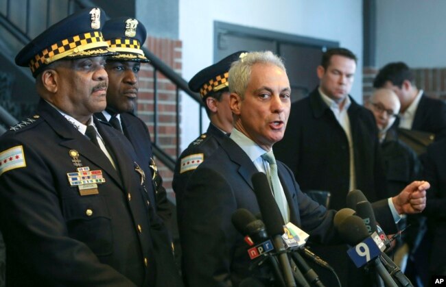 Chicago Mayor Rahm Emanuel, right, and Chicago Police Superintendent Eddie Johnson appear at a news conference in Chicago, March 26, 2019, after prosecutors abruptly dropped all charges against "Empire" actor Jussie Smollett.