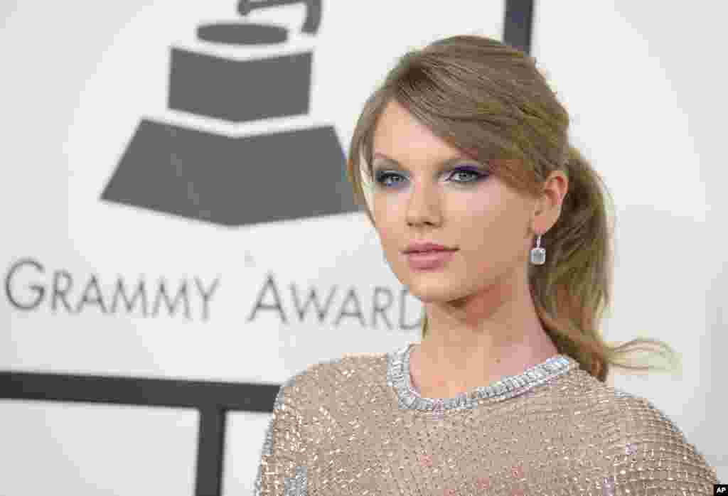 Taylor Swift arrives at the 56th annual GRAMMY Awards at Staples Center on Jan. 26, 2014, in Los Angeles.