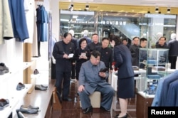 North Korean Leader Kim Jong Un visits Taesong Department Store just before its opening, in this photo released April 8, 2019 by North Korea's Korean Central News Agency.