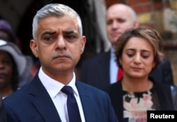 Mayor of London Sadiq Khan speaks after meeting victims and volunteers of the Grenfell apartment tower fire at a church in north Kensington, London, June 18, 2017.