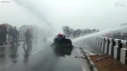 Police Fire Water Cannons at Protesting Farmers in India