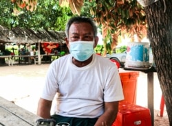 Ly Koeung, father to the 20-year-old girl who died in a road accident, gives an interview to VOA Khmer at his home in Kampong Chhnang province, on Oct. 24, 2021. (Kann Vicheika/VOA Khmer)