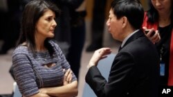 U.S. Ambassador to the United Nations Nikki Haley talks with Chinese deputy ambassador Wu Haitao, Dec. 22, 2017, at United Nations headquarters ahead of a vote on proposed new sanctions against North Korea.