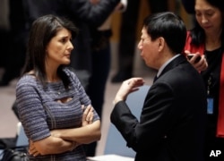 U.S. Ambassador to the United Nations Nikki Haley talks with Chinese deputy ambassador Wu Haitao, Dec. 22, 2017, at United Nations headquarters ahead of a vote on proposed new sanctions against North Korea.