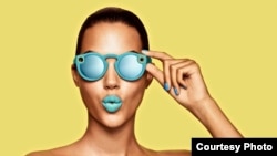 Snap Inc. has started selling its Spectacles sunglasses online in the United States. The glasses can record short video clips that can be shared with Snapchat users. (Snap Inc.)