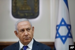 FILE - Israel Prime Minister Benjamin Netanyahu attends the weekly Cabinet meeting at his office in Jerusalem, Oct. 7, 2018.