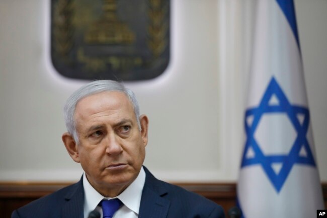 FILE - Israel Prime Minister Benjamin Netanyahu attends the weekly Cabinet meeting at his office in Jerusalem, Oct. 7, 2018.