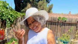 This photo shows Lagetta Wayne, 78, in her garden in Suisun City, Calif., on Aug. 10, 2021. Wayne is among a growing number of “grandfluencers,” folks 70 and up who are making names for themselves on social media. (KiKi Rose via AP)