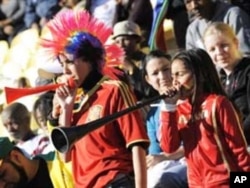 Not all foreign football supporters loathe the vuvuzela. Here, two young Spanish fans blow vuvuzelas at last year's Confederation Cup in South Africa