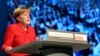 Poll Gap Between Merkel's Conservatives, Social Democrats Shrinking
