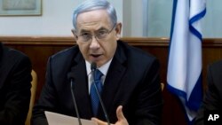 FILE - Israeli Prime Minister Benjamin Netanyahu speaks during in his Cabinet meeting in his office in Jerusalem, Nov. 23, 2014. 