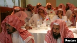 FILE - Saudi members of the Committee for the Promotion of Virtue and Prevention of Vice, or religious police, attend training in Riyadh, Sept. 1, 2007.