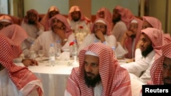 FILE - Members of Saudi Committee for the Promotion of Virtue and Prevention of Vice, or religious police, attend a training course in Riyadh. 