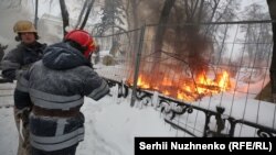 Riot police remove a tent camp set up last October by supporters of Mikheil Saakachvili, who are demanding President Petro Poroshenko resign, detaining over 100 people, in Kyiv, Ukraine, March 3, 2018.