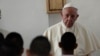 Pope Francis listens to the words of an inmate at the Las Garzas de Pacora detention center for minors before the start of a penitential Mass, in Panama, Jan. 25, 2019. 