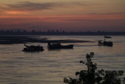 A sand dredging operation is underway in the Mekong River, Kratie province, Cambodia, July 16, 2020. (Sun Narin/VOA Khmer)