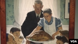 Norman Rockwell's "Freedom of Worship" shows a family's Thanksgiving dinner, The title of the painting suggests a vision for a world without discrimination based on religious practice or belief. (J.Taboh/VOA)