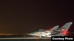 Two of four RAF Tornados prepare to take-off from Akrotiri, Cyprus, April 13, 2018.
