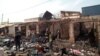 Débris des boutiques brûlées lors d’une attaque d’hommes armés, au PK5, Bangui, 18 janvier 2018.