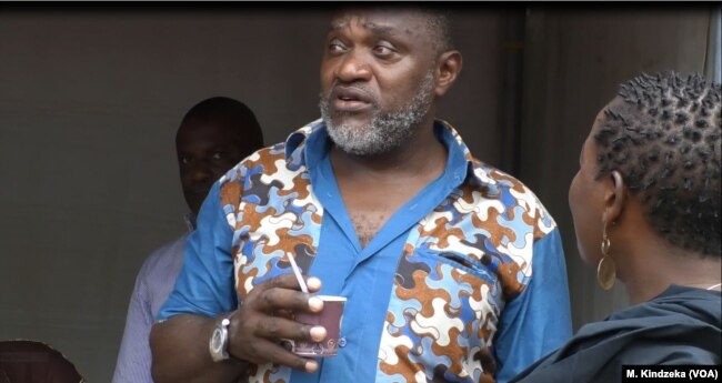 A man drinks Cameroon coffee, April 17, 2019, at the annual coffee festival in Yaounde, Cameroon.