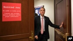 FILE - Rep. Adam Schiff, D-Calif., ranking member of the House Intelligence Committee, exits a secure area to speak to reporters, on Capitol Hill in Washington, March 22, 2018.