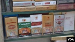 Warnings presently cover 40 percent of the front of a cigarette pack (A. Pasricha/VOA)