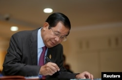 FILE - Cambodia's Prime Minister Hun Sen at the National Assembly of Cambodia, in central Phnom Penh, Oct. 12, 2017.