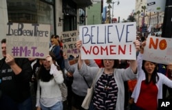 Participants march against sexual assault and harassment at the #MeToo March in the Hollywood section of Los Angeles on Nov. 12, 2017.