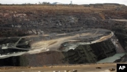 FILE: An open pit is seen at a Debswana mine, a joint venture between De Beers and Botswana's government, in Jwaneng, Botswana. Taken Mar.17, 2008