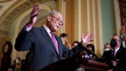 Senate Majority Leader Chuck Schumer, D-N.Y., speaks to reporters at the Capitol in Washington, Sept. 28, 2021.