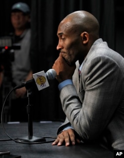 Los Angeles Lakers forward Kobe Bryant reflects at news conference on why he decided to announce his retirement prior to an NBA basketball game against the Indiana Pacers in Los Angeles, Sunday, Nov. 29, 2015. The Pacers won 107-103. (AP Photo)