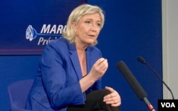 Marine Le Pen criticizes the European Union as being responsible for the Ukraine crisis with Russia. (L. Bryant/VOA)