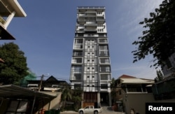 FILE - A high-rise is seen in central Phnom Penh, Cambodia, Oct. 19, 2015.