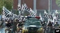 Jamat ud Dawa, formerly Lashkar-e Taiba parading in a Pakistani city (file photo)