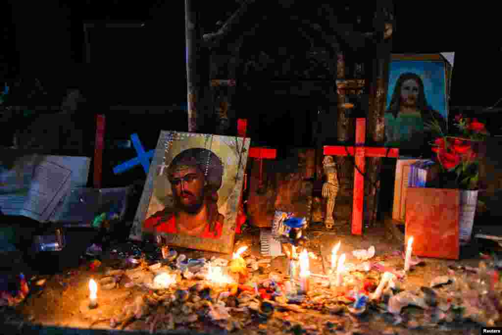 Iraqi Christians come to visit the heavily damaged Church of the Immaculate Conception after Iraqi forces recaptured it from Islamic State in Qaraqosh, near Mosul, Iraq.