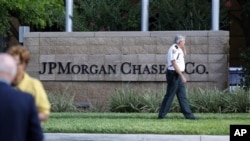 Law enforcement secure grounds of JP Morgan Chase annual stockholders meeting in Tampa, Fla., May 15, 2012.