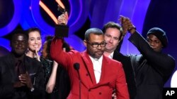 Jordan Peele accepts the award for best feature for "Get Out" at the 33rd Film Independent Spirit Awards, March 3, 2018, in Santa Monica, Calif.