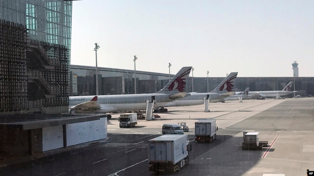 Qatar Airways planes are seen parked at the Hamad International Airport in Doha, Qatar, June 16, 2017.