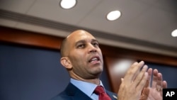 Rep. Hakeem Jeffries, D-N.Y., meets with reporters after being elected chairman of the House Democratic Caucus for the 116th Congress, at the Capitol in Washington, Nov. 28, 2018.