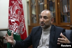 In this Oct. 24, 2015, photo, Afghan National Security Adviser Mohammad Hanif Atmar speaks with The Associated Press, in Kabul, Afghanistan.
