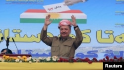Iraqi Kurdish President Masoud Barzani gestures as he attends a rally in support for the Sept. 25 independence referendum in Zakho, Iraq, Sept. 14, 2017.