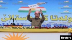 លោក Masoud Barzani មេដឹកនាំ​ឃឺដ​ក្នុង​ប្រទេស​អ៊ីរ៉ាក់​ចូលរួម​ក្នុង​ការ​ប្រមូល​ផ្តុំ​នៅ​ដើម្បី​គាំទ្រ​ដល់​ការ​ធ្វើ​ប្រជាមតិ​ទាមទារ​ឯករាជ្យ​នៅ​ក្នុង​ក្រុង Zakho ប្រទេស​អ៊ីរ៉ាក់ កាលពី​ថ្ងៃទី១៤ ខែកញ្ញា ឆ្នាំ២០១៧។