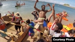 Pacific climate warriors celebrate their successful protest, stopping a coal ship from leaving Australia's Port of Newcastle. (Credit: International Wow Company)