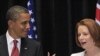 美国总统奥巴马和澳大利亚总理吉拉德11月16日在堪培拉举行的记者会上