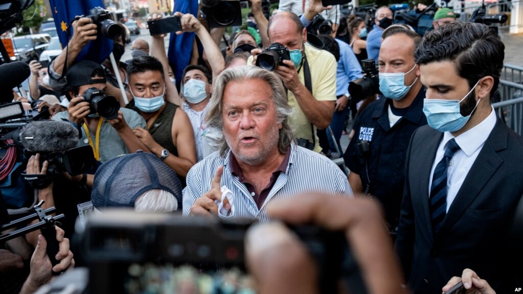 President Donald Trump's former chief strategist Steve Bannon leaves federal court, Thursday, Aug. 20, 2020. He pleaded not guilty to charges of defrauding donors in an online fundraising scheme to build a southern border wall. (AP Photo/Craig Ruttle)