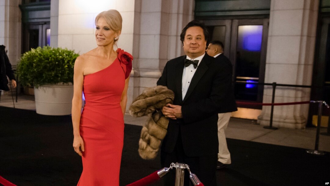 FILE - Adviser Kellyanne Conway, accompanied by her husband, George, arrive for a dinner at Union Station in Washington, Jan. 19, 2017, a day before Donald Trump's inauguration.