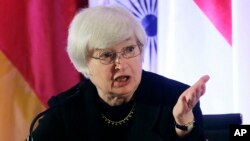 Janet Yellen answers a question from a participant at the International Monetary Conference in Shanghai, China, June 2013 file photo..