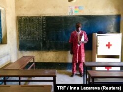 Adoumkidjim Naiban, the founder of CESER Center, stands in the classroom of the school he founded and built - the country's only school for mentally handicapped children. N'Djamena, Chad, Sept. 23, 2017.