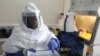 Daktari akionyesha matokeo ya vipimo vya Ebola katika maabara ya Entebbe, Uganda. Aug 2, 2012
