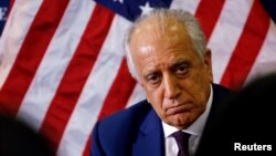 FILE - U.S. special envoy for peace in Afghanistan, Zalmay Khalilzad, talks with local reporters at the U.S. embassy in Kabul, Afghanistan, Nov. 18, 2018.